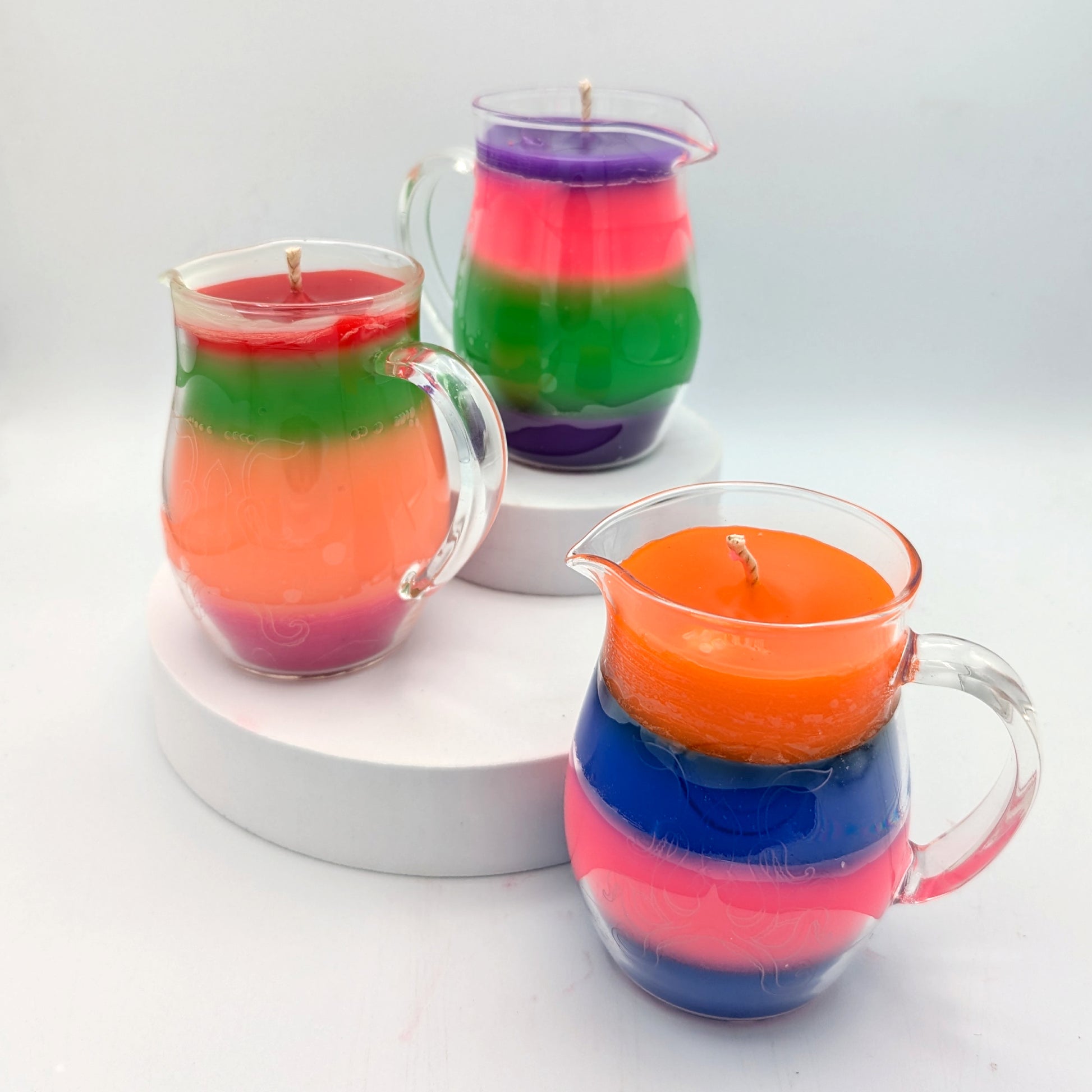 Multi color pitcher candles